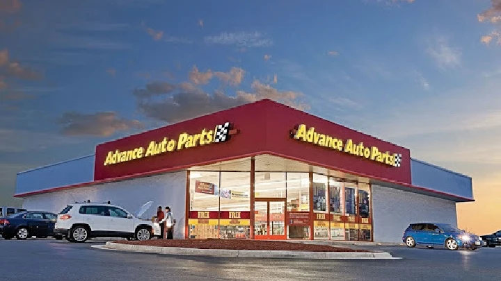 Advance Auto Parts store at sunset.