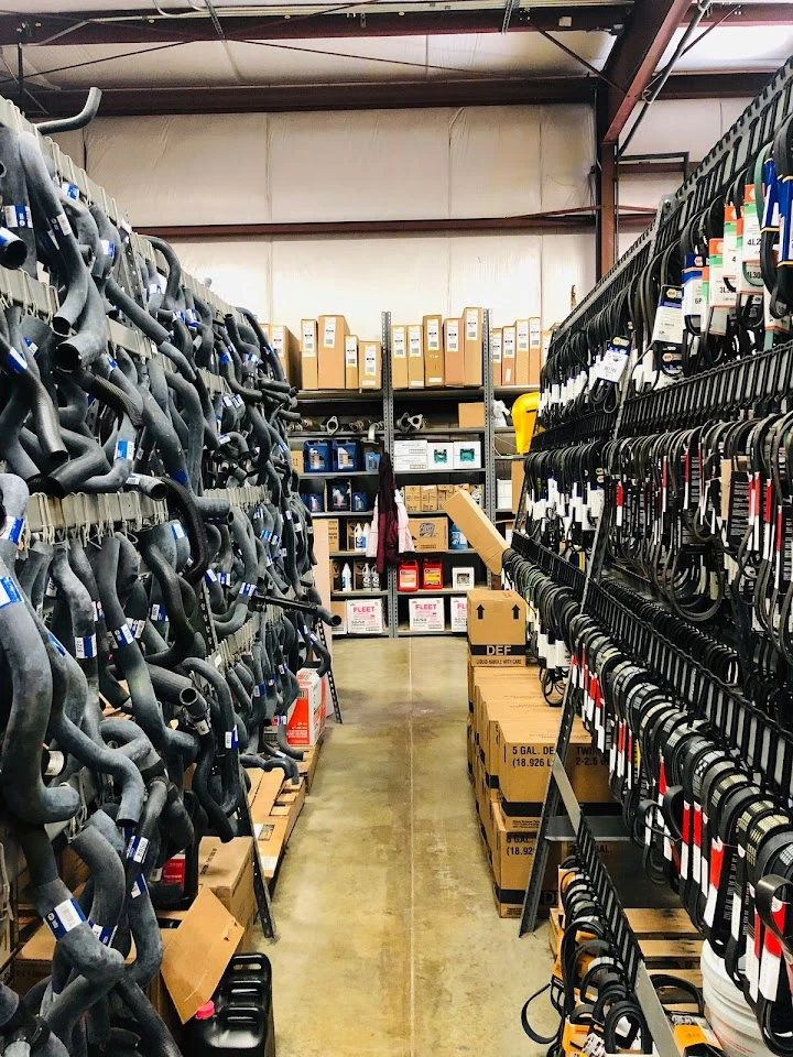 Auto parts displayed in a warehouse aisle.