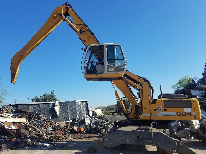 Excavator at Eagle Metals Recycling site.