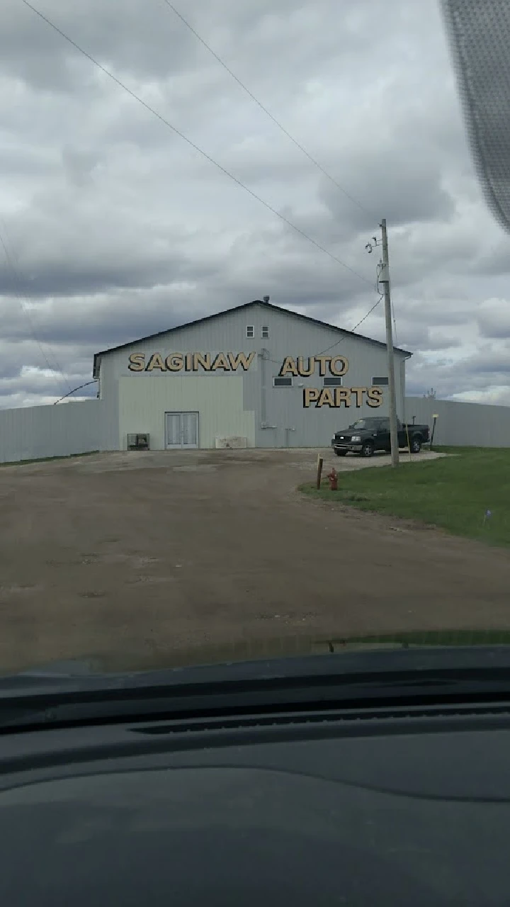 Saginaw Auto Parts building and driveway view.