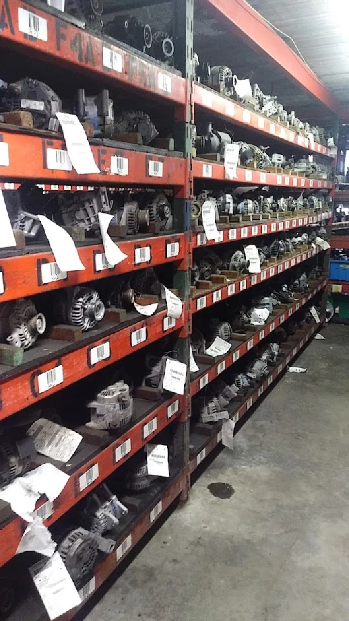 Shelves of used auto parts at ACE Used Auto Parts.