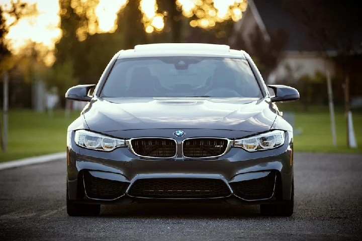 Sleek BMW sports car in a sunny setting.