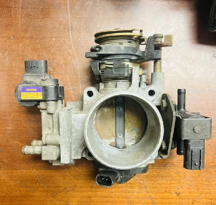 Used auto parts: Throttle body assembly for sale.