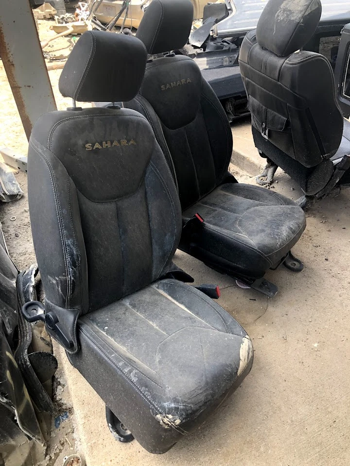 Used Sahara car seats in dusty condition.