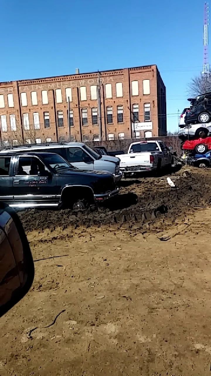 Vehicles at PADNOS Saginaw Recycling Center yard.