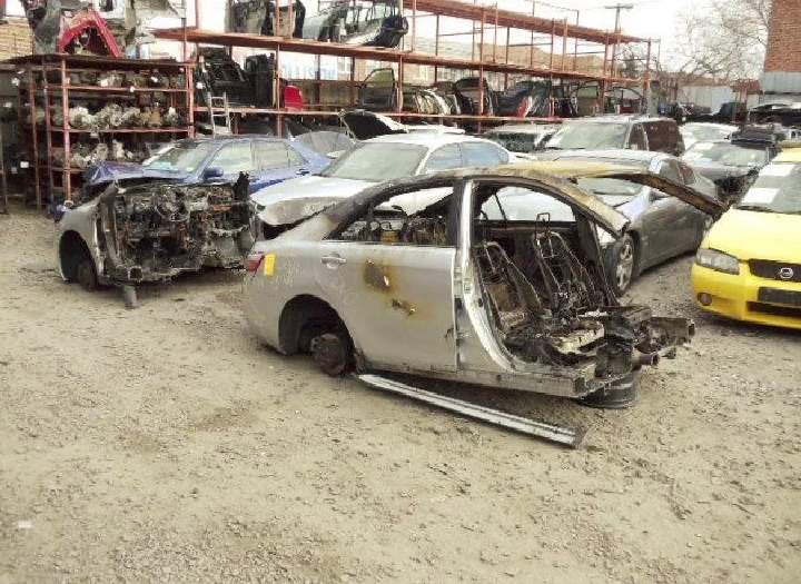 Abandoned cars at J & V Auto Parts yard.