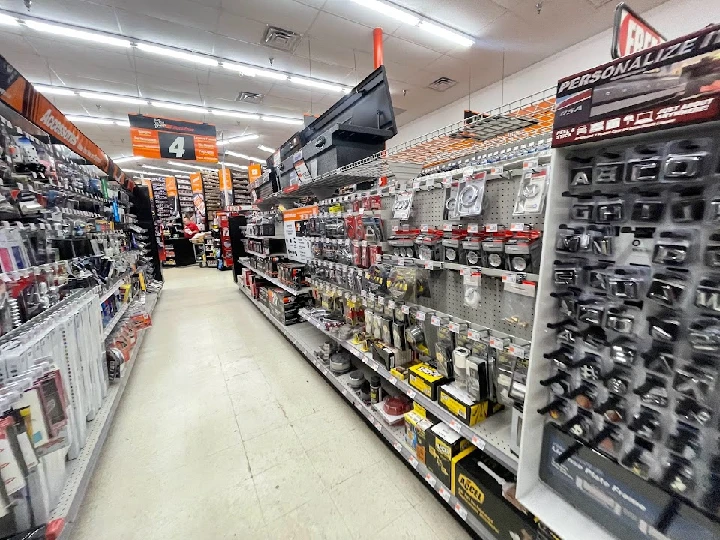 Auto parts aisle with various tools and accessories.