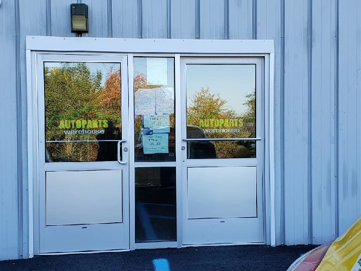 AutoParts Warehouse entrance with double doors.