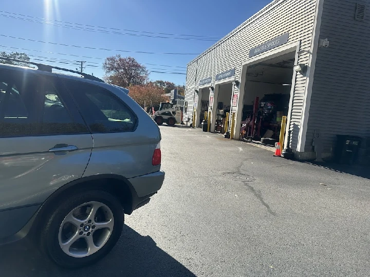 AutoZone location with a vehicle parked nearby.