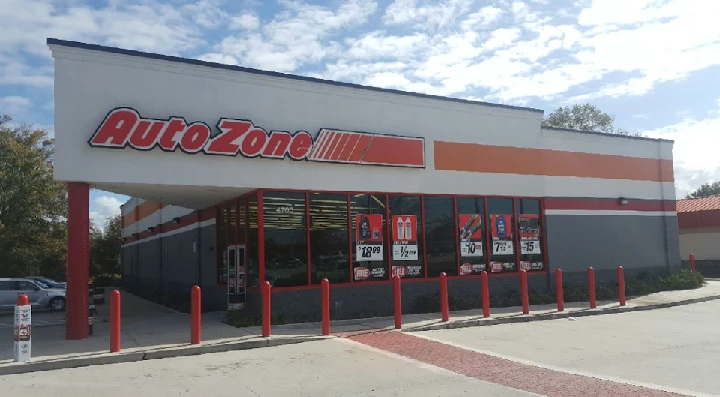 AutoZone store exterior with sales promotions.