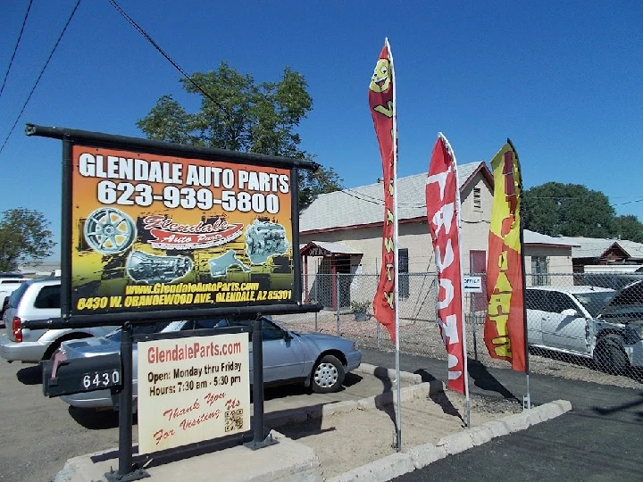 Glendale Auto Parts sign with contact details.