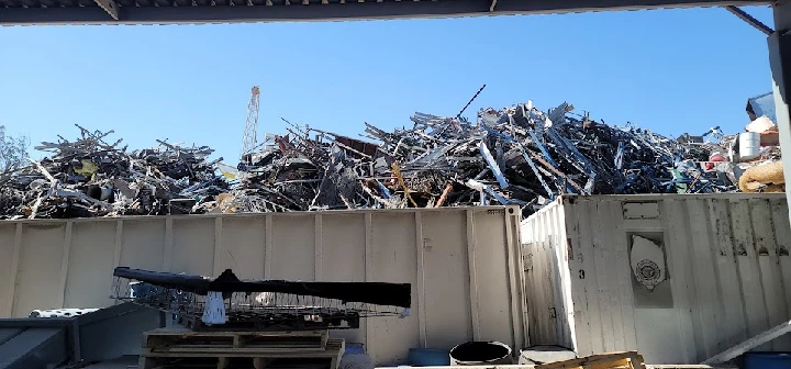 Piles of scrap metal at a recycling facility.