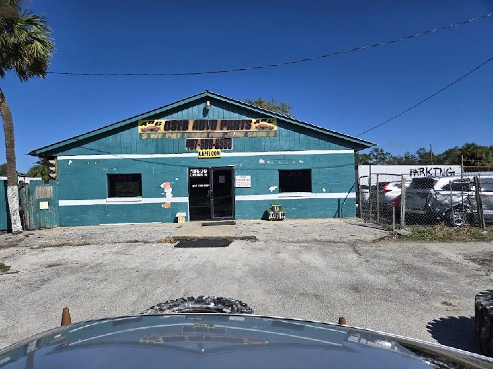 ABC Used Auto Parts storefront and parking area.