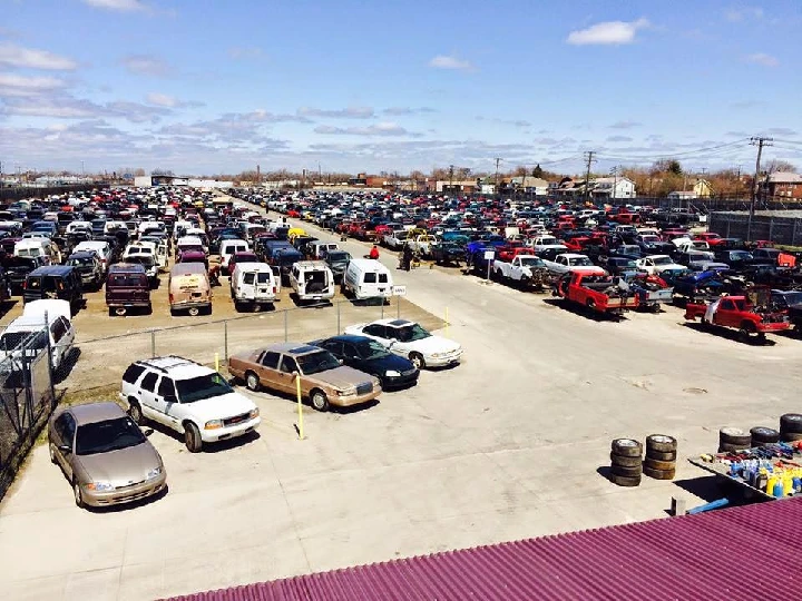 Aerial view of a large car salvage yard.