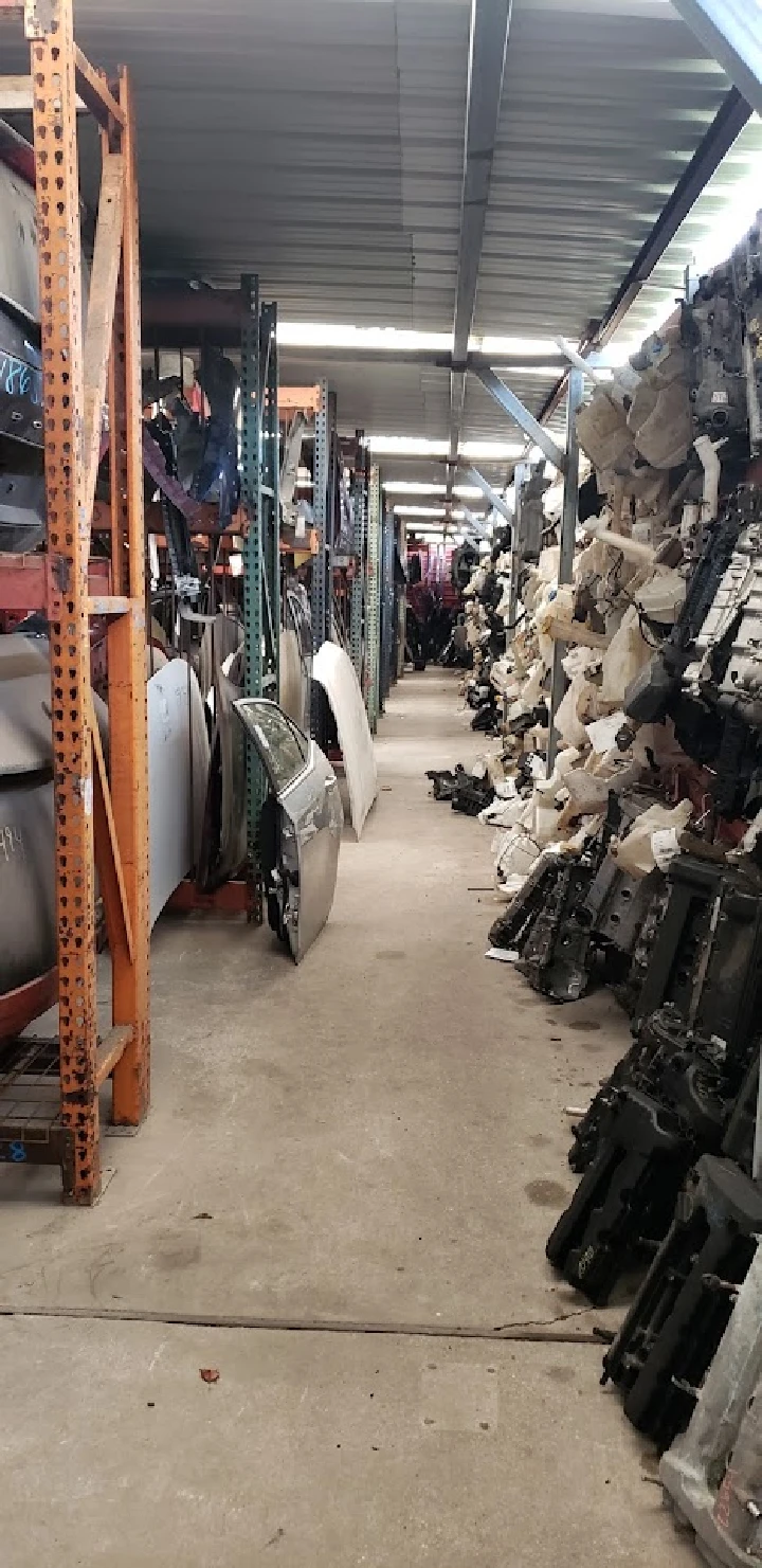 Auto parts aisle filled with used components.