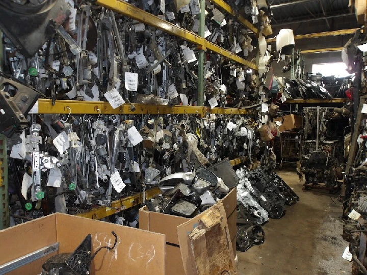 Auto parts and salvage in a busy storage area.