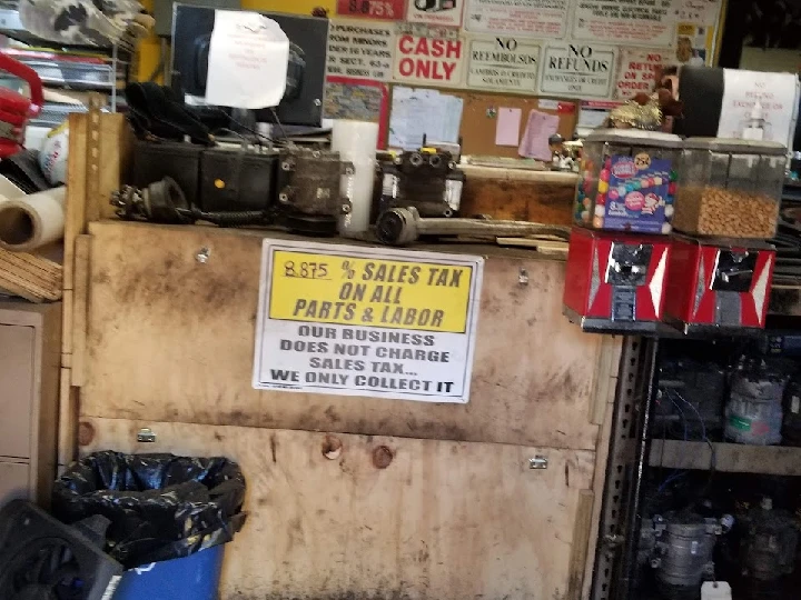 Auto parts store with tax information displayed.