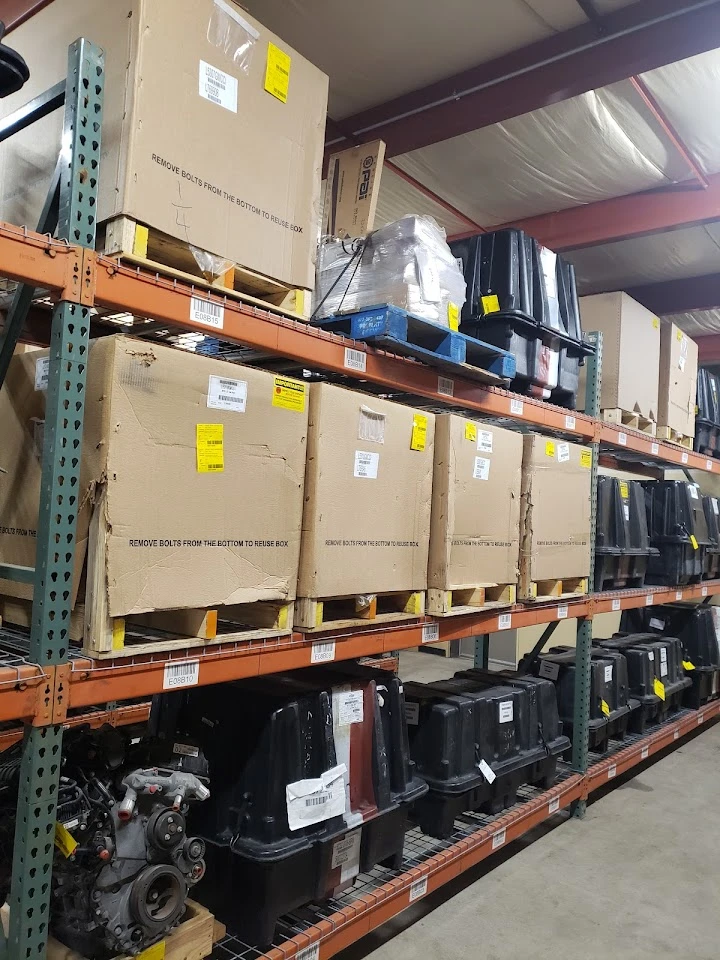 Auto parts stored on shelves in a warehouse.