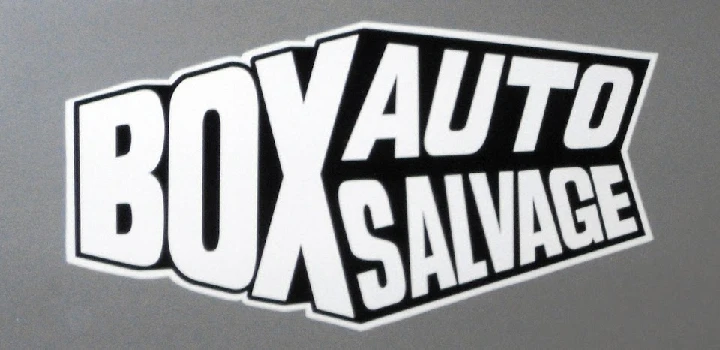 Box Auto Salvage logo on a gray background.