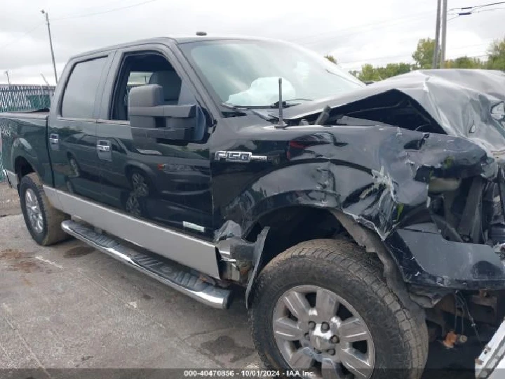 Damaged black Ford F-150 pickup truck.