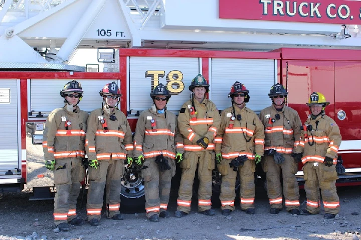 Firefighters from Four Brothers Inc posing together.