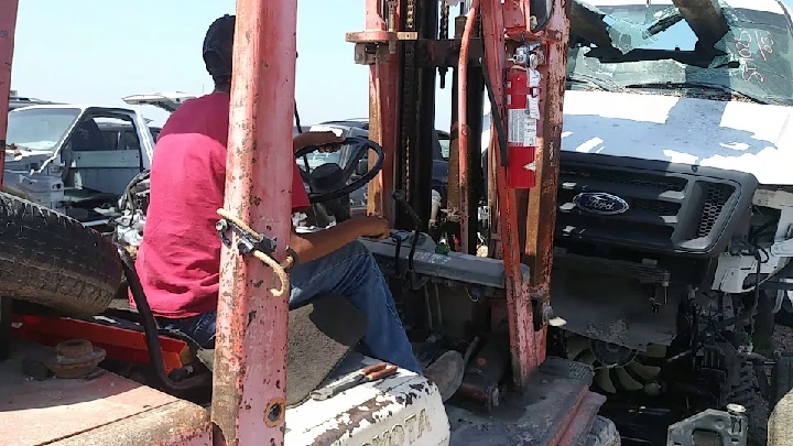 Forklift operator at South Texas Truck Salvage yard.