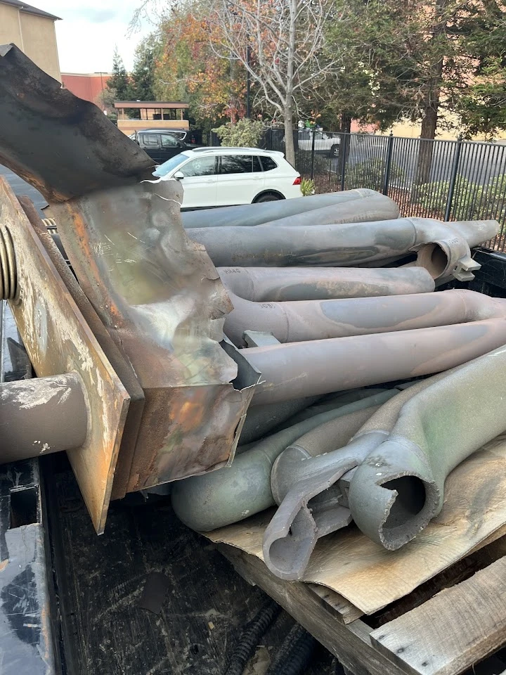 Piled metal parts ready for recycling.