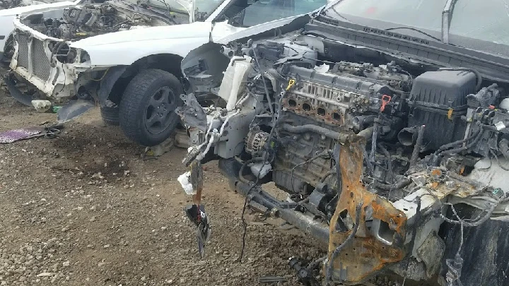 Scrap cars and engines at U-Pull-&-Pay Denver.