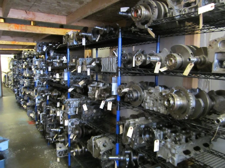 Shelves filled with automotive engine parts.