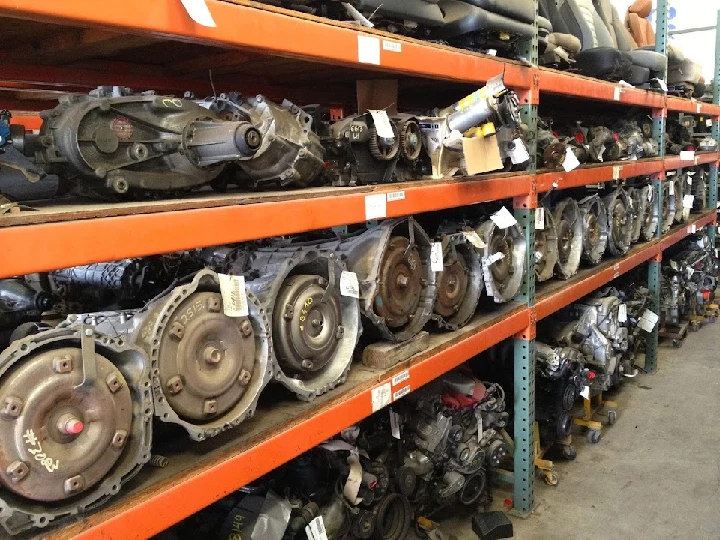 Shelves of used auto engines and parts.