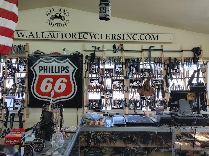 Shop interior with tools and memorabilia displayed.