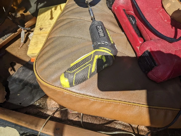 Tools on a car seat at U-Pull-It Auto Parts.