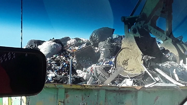 Truck loading recyclable materials at Danny's Auto Recycling.