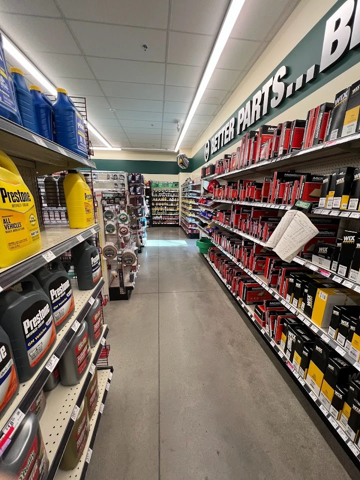 Aisle filled with auto parts and automotive supplies.