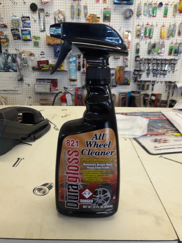 All Wheel Cleaner spray bottle on a display table.