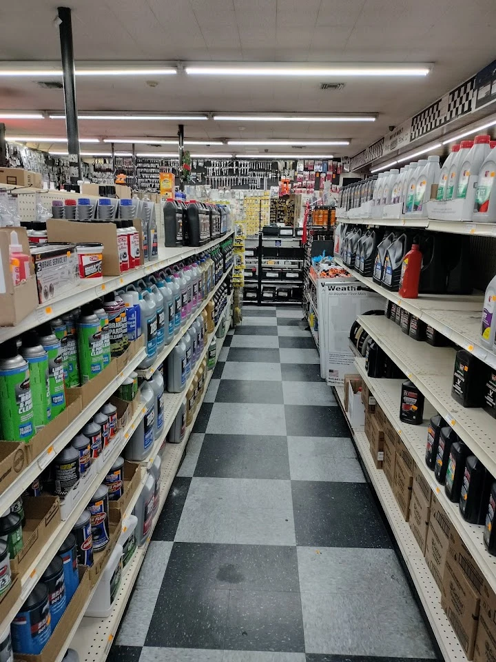 Auto parts aisle with shelves of products.