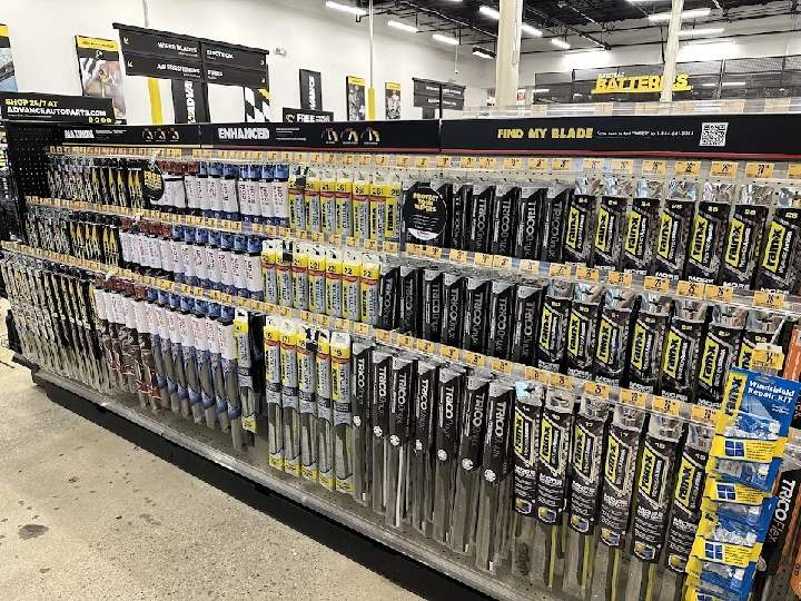 Auto parts display featuring various windshield wipers.