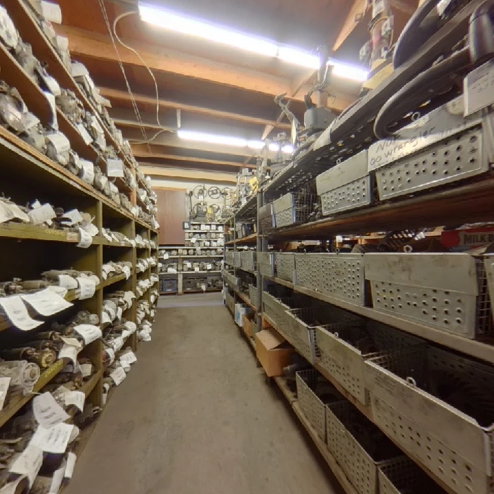 Auto parts storage aisle at Daurio Auto Truck.