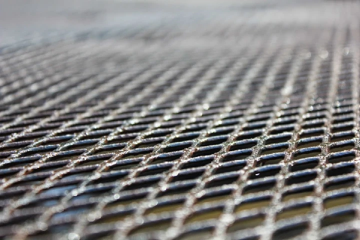 Close-up of a metal mesh surface.