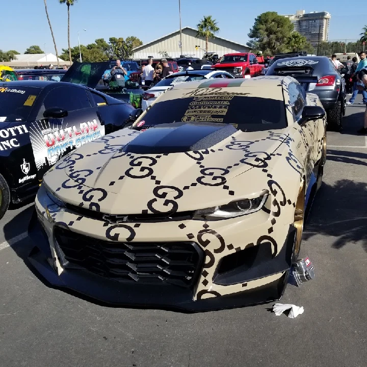 Custom car with unique design at auto show.