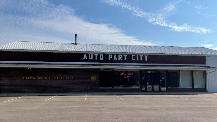 Exterior of Auto Part City store building.