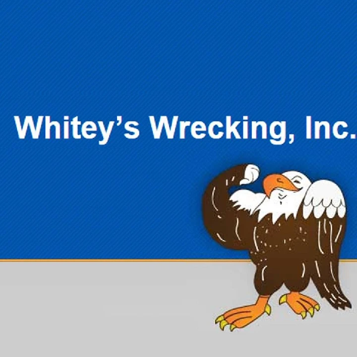 Logo of Whitey's Wrecking, Inc. with an eagle mascot.