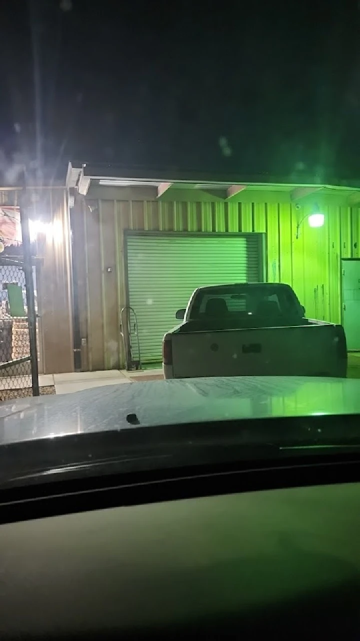 Night view of Eagle Auto Parts facility entrance.