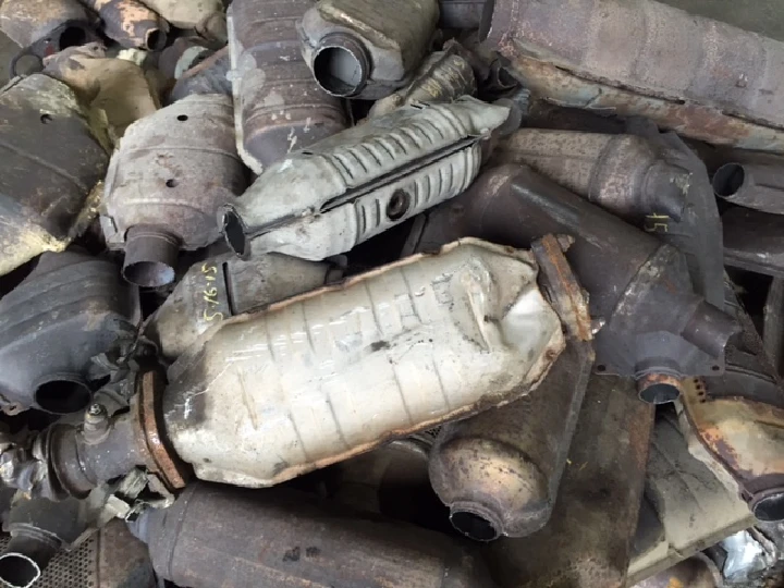 Piled used catalytic converters at Dahl & Groezinger Inc.