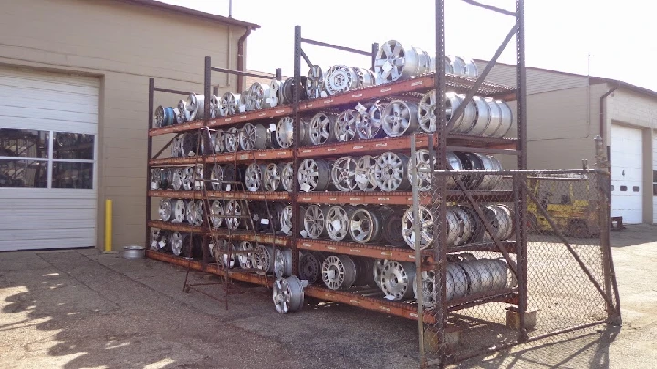 Racks of alloy wheels at Complete Auto & Truck Parts.