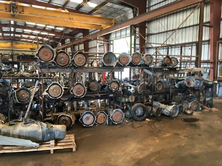 Storage area filled with auto parts and engines.