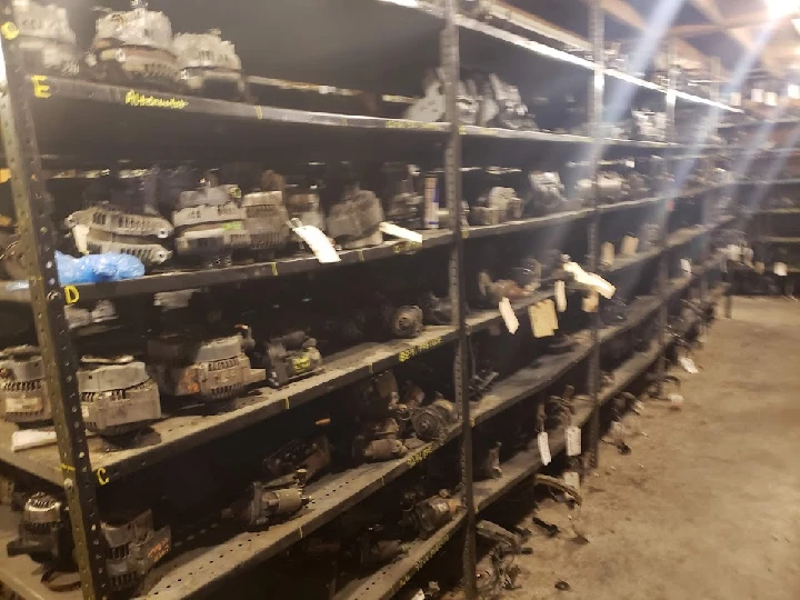 Storage shelves filled with automotive parts.