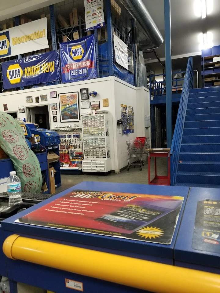 Store interior with NAPA banners and supplies.