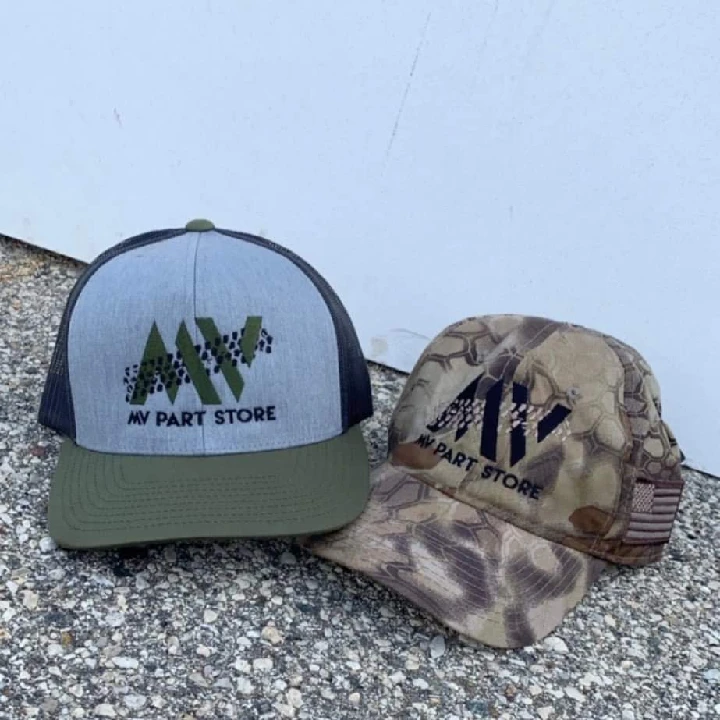 Two hats branded with MV Part Store logo.