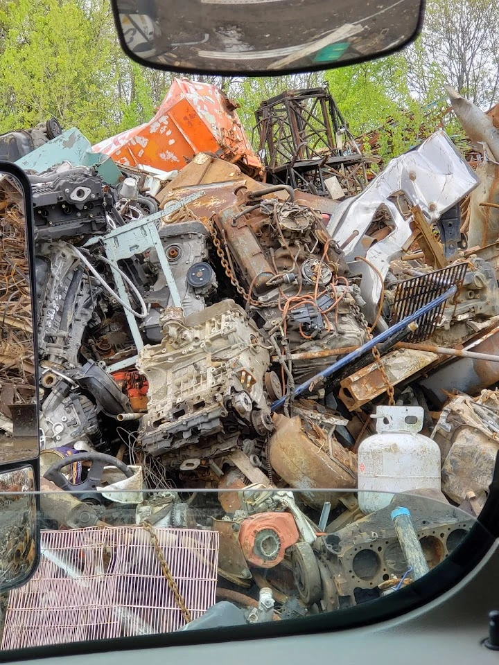 View of a scrap metal pile at a recycling center.